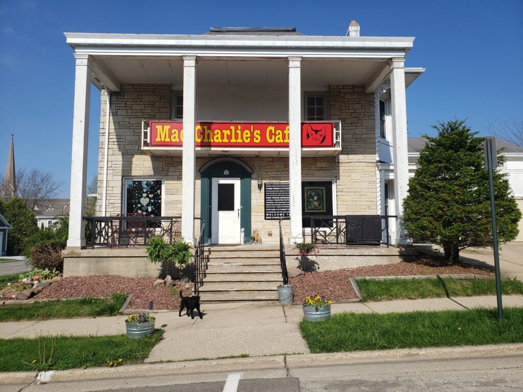Photo of the front of the Mad Charlie's Cafe building.